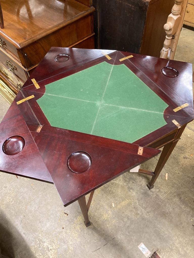 An Edwardian satinwood banded mahogany envelope card table, width 52cm depth 52cm height 77cm